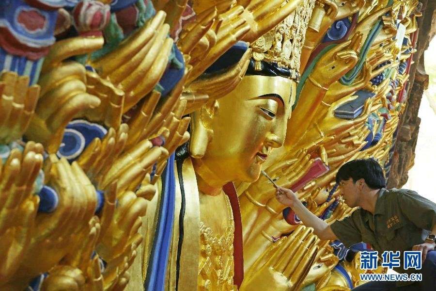 ཁྲུང་ཆིང་གི་སྤྱན་རས་གཟིགས་ཕྱག་སྟོང་སྤྱན་སྟོང་གི་སྐུ་བརྙན་ཞིག་གསོ་ལེགས་འགྲུབ་བྱུང་ཡོད།