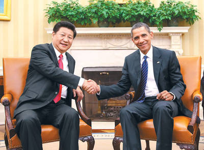 ཞི་ཅིན་ཕིང་གིས་ཨ་རིའི་སྲིད་འཛིན་ཨཱོ་པ་མ་དང་གྲོས་མོལ་གནང་།