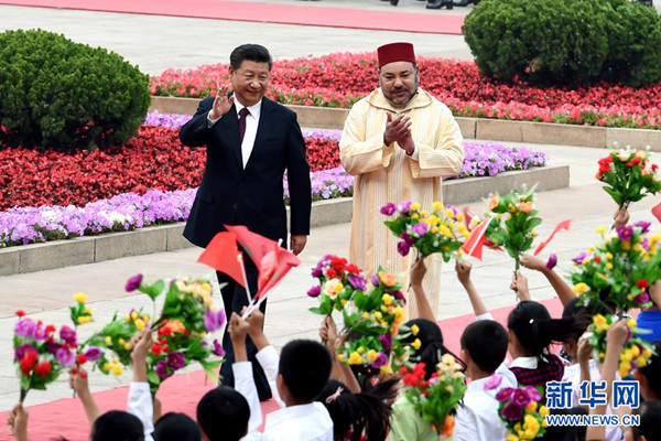 ཞི་ཅིན་ཕིང་གིས་མོ་རོ་ཁོ་རྒྱལ་ཁབ་ཀྱི་རྒྱལ་པོ་སྐུ་ཕྲེང་དྲུག་པ་མོའོ་ཧན་མོ་ཏི་དང་གྲོས་མོལ་མཛད།
